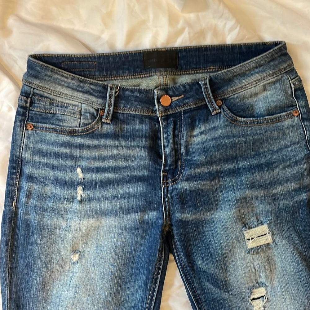 Buckle black bootcut jeans